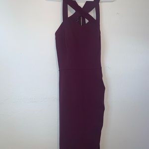 Purple mini dress with open back, zip lace position of upper back.